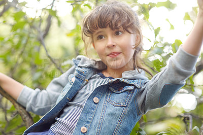 Buy stock photo Shot of a cute little girl playing outdoors
