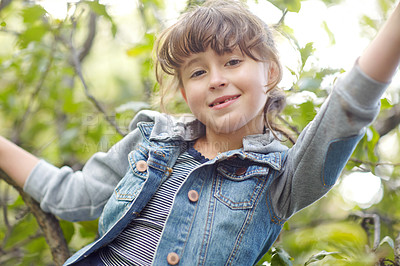 Buy stock photo Portrait of a cute little girl playing outdoors