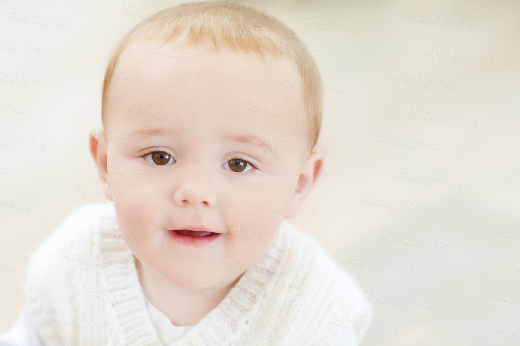 Buy stock photo Close up of an adorable little boy smiling at the camera