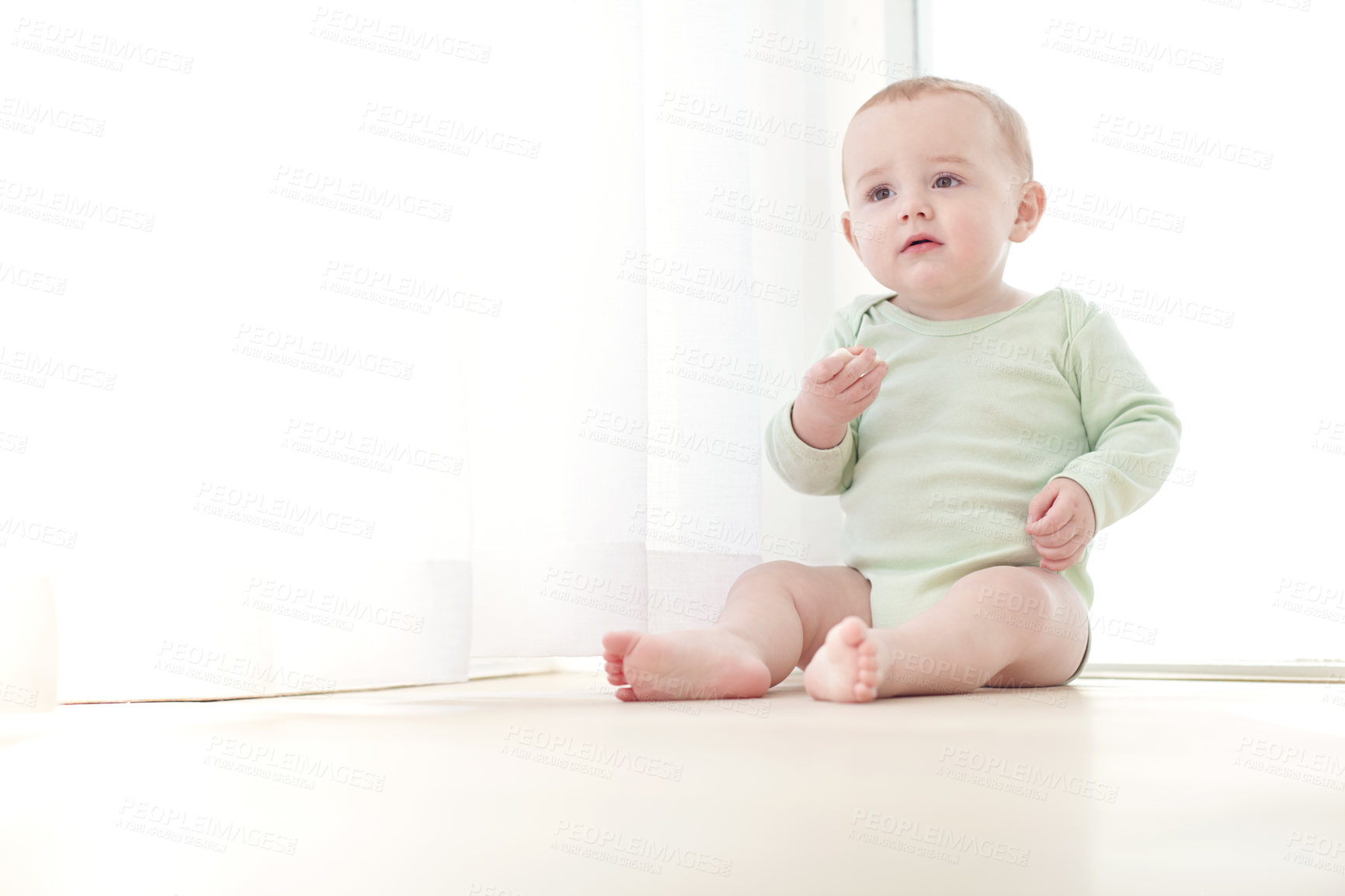 Buy stock photo Child development, eating and milestone with toddler on floor in living room for growth. Food, pain relief and teething biscuit with infant kid in apartment for baby teeth symptoms or swollen gums