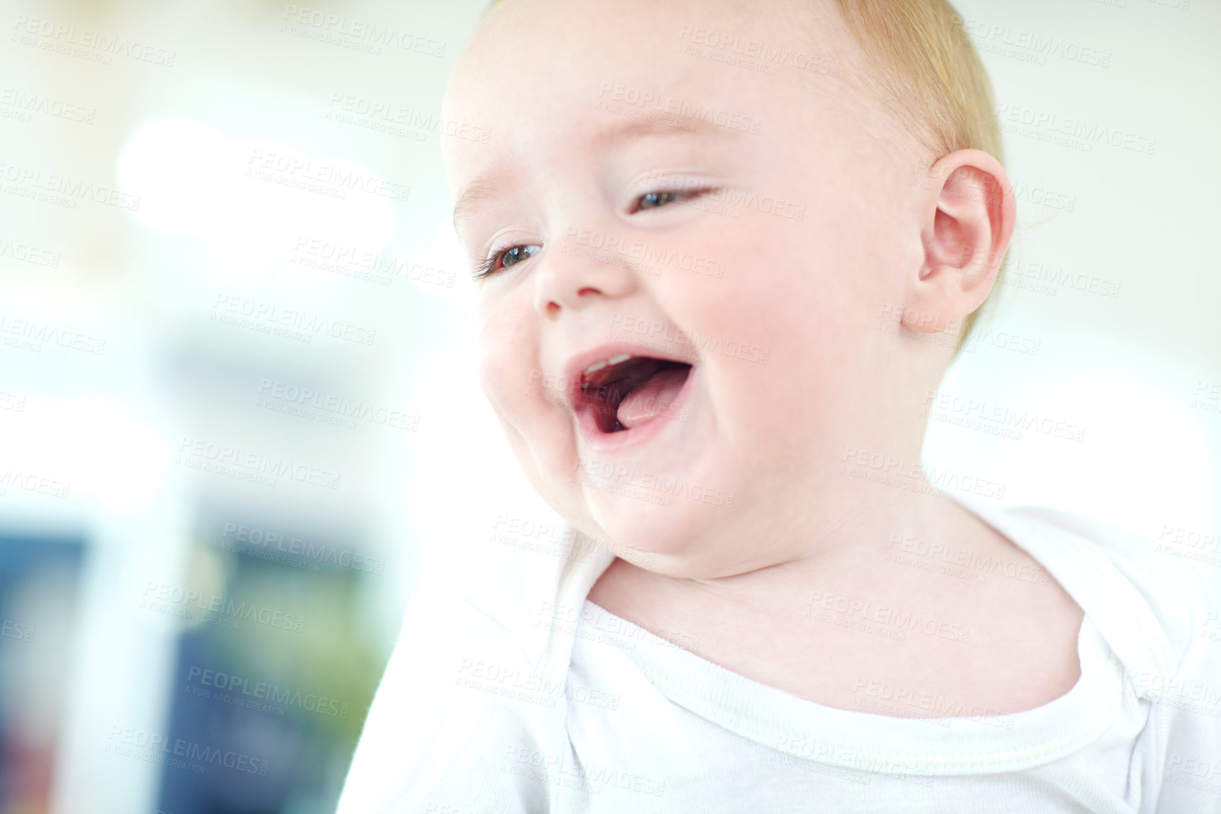 Buy stock photo Shot of an adorable baby boy laughing