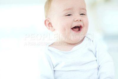 Buy stock photo Shot of an adorable baby boy laughing