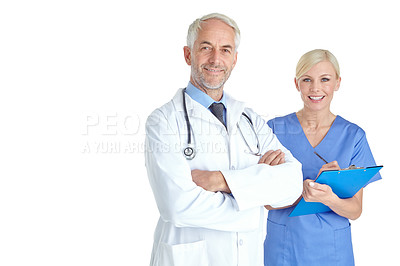 Buy stock photo Portrait of a mature male doctor standing beside a female colleague holding a chart