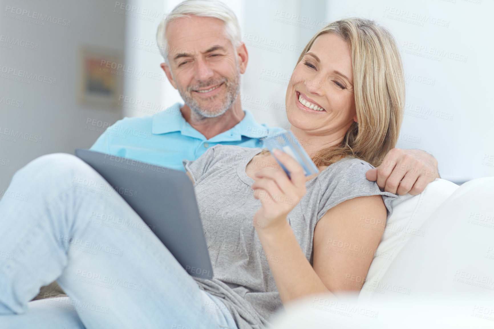 Buy stock photo Mature couple, credit card or tablet banking for financial management, investment security or finance in living room. Smile, happy or relax man or woman on technology for house insurance or home loan