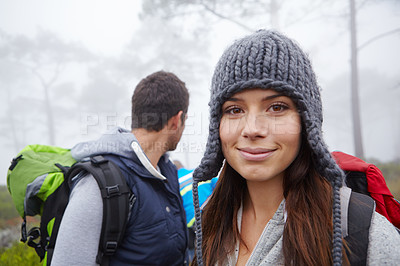 Buy stock photo Portrait of an attractive young woman out hiking with her boyfriend