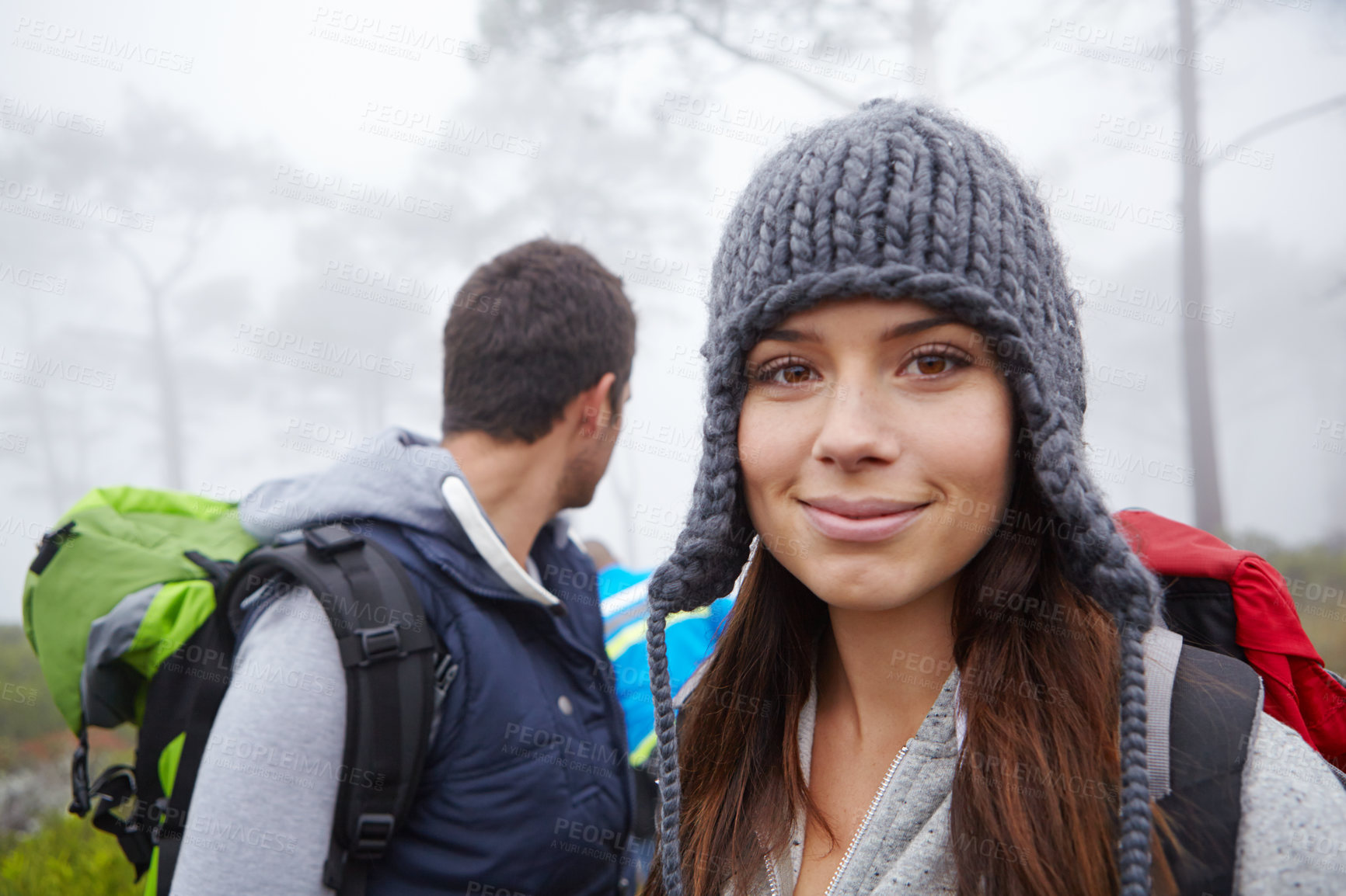 Buy stock photo Portrait of an attractive young woman out hiking with her boyfriend