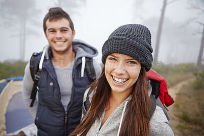 Buy stock photo Portrait of a young couple on a hiking trip