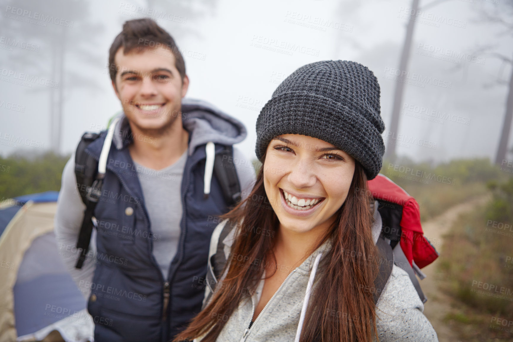 Buy stock photo Portrait of a young couple on a hiking trip