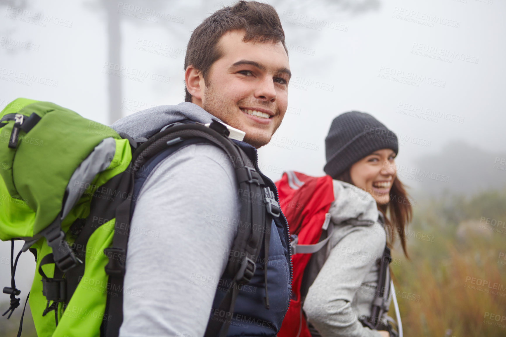 Buy stock photo Portrait of a handsome young man out hiking with his girlfriend