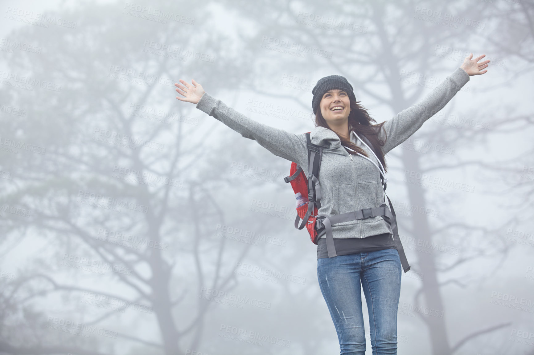 Buy stock photo Hiking, vacation and freedom with woman in nature for trekking adventure, backpacking and success. Courage, tourism and space with person outdoor for wellness, celebration and holiday getaway