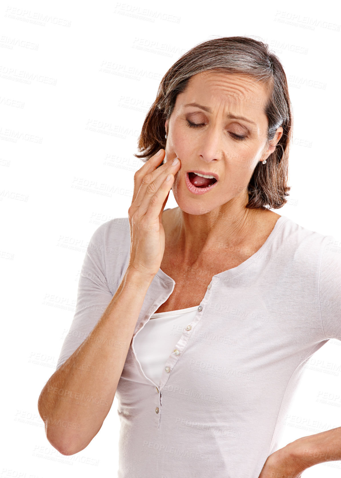 Buy stock photo Mature woman, studio and toothache or pain with dental injury, infection and emergency on white background. Female person, gum problem and oral care with worry for cavity decay, irritation and crisis