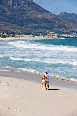 Buy stock photo Couple, support and walking on beach for travel, bonding and tropical holiday with blue sky or sand. Man, woman and ocean outdoor for trip, love and vacation with sunshine, relax and date on weekend