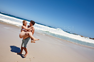 Buy stock photo Beach, carrying and fun for couple, bonding and celebration of commitment, smile and happy in relationship. Outdoor, man and woman on holiday, waves and together in nature, romance and date at sea