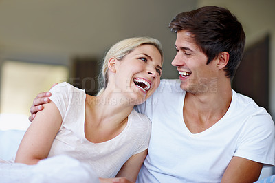 Buy stock photo Home, couple and love with laughing for joke, funny memory and bonding together in healthy relationship. House, man and woman with hug embrace for admiration, connection and commitment in dating