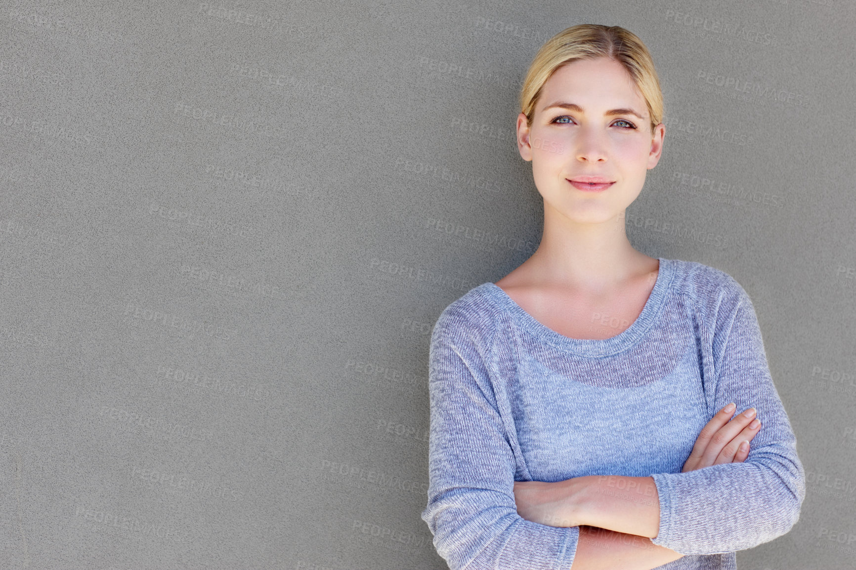 Buy stock photo Woman, portrait and outdoor by grey wall with mockup space, gen z and modern fashion. Home, style and person from Switzerland with arms crossed, calm and confidence with casual and trendy clothes