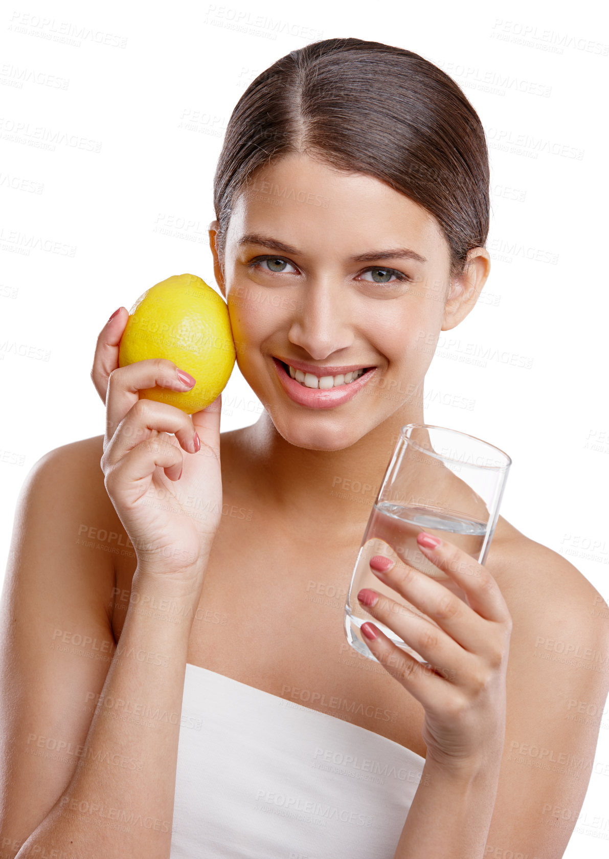 Buy stock photo Skincare, woman and lemon water in studio for portrait, detox and vitamin C in Portugal. Happy girl, citrus fruit and glass on white background for antioxidants, skin hydration and healthy complexion