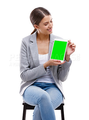 Buy stock photo Happy woman, presentation and tablet with green screen for advertising or marketing on a white studio background. Young, female person or model with smile, chromakey or technology display for mockup