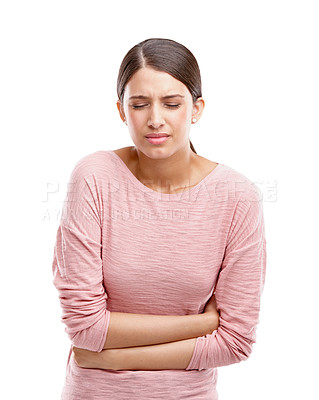 Buy stock photo Studio, constipation and woman stomach pain, sick or digestion problem isolated on white background. Sad, angry and frustrated model endometriosis, gut health or pancreas risk in advertising mockup