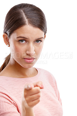 Buy stock photo Woman, pointing finger and standing isolated on a white background alone, serious or choosing. Portrait of young female model showing finger for decision or choice against a white studio background