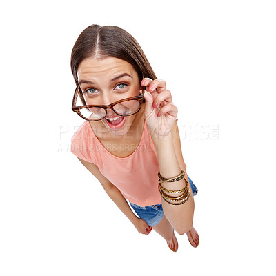 Buy stock photo Woman, comedy and portrait of a model with glasses, smile and casual fashion being silly. White background, happiness and isolated young person looking up in a studio feeling positive, comic and fun