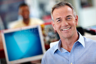 Buy stock photo Portrait, business and man with smile, computer or confidence in modern office. Face, mature person or employee with pc, pride or career ambition with design agency or consultant for creative project