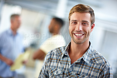 Buy stock photo Portrait of a confident young man in a casual office environment 