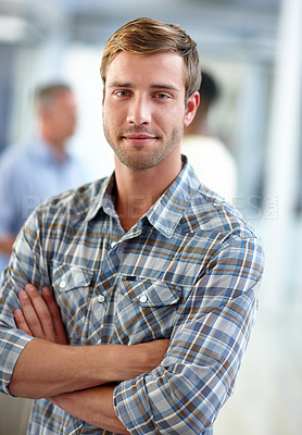 Buy stock photo Portrait of a confident young man in a casual office environment 