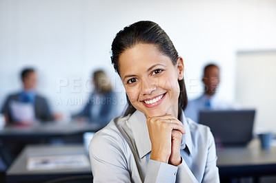 Buy stock photo Portrait of a beautiful young businesswoman enjoying a day at the office