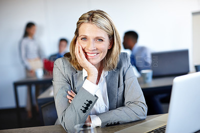 Buy stock photo Mature woman, business and laptop in office for research, communication and networking clients. Employee, portrait and tech for project management, corporate development or sustainability integration