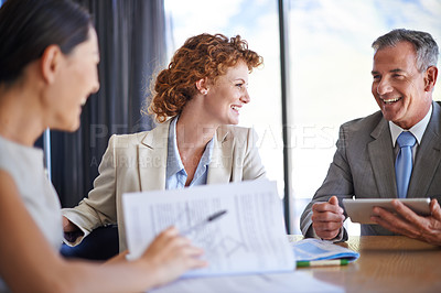 Buy stock photo Meeting, tablet and business people in discussion with documents for planning, teamwork and project ideas. Corporate, collaboration and men and women on digital tech for feedback, review and talking