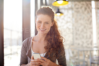 Buy stock photo Office, woman and portrait with cellphone for chat, connect and text message with contact. Workplace, female person and startup with digital for mobile app, networking and creative agency with smile