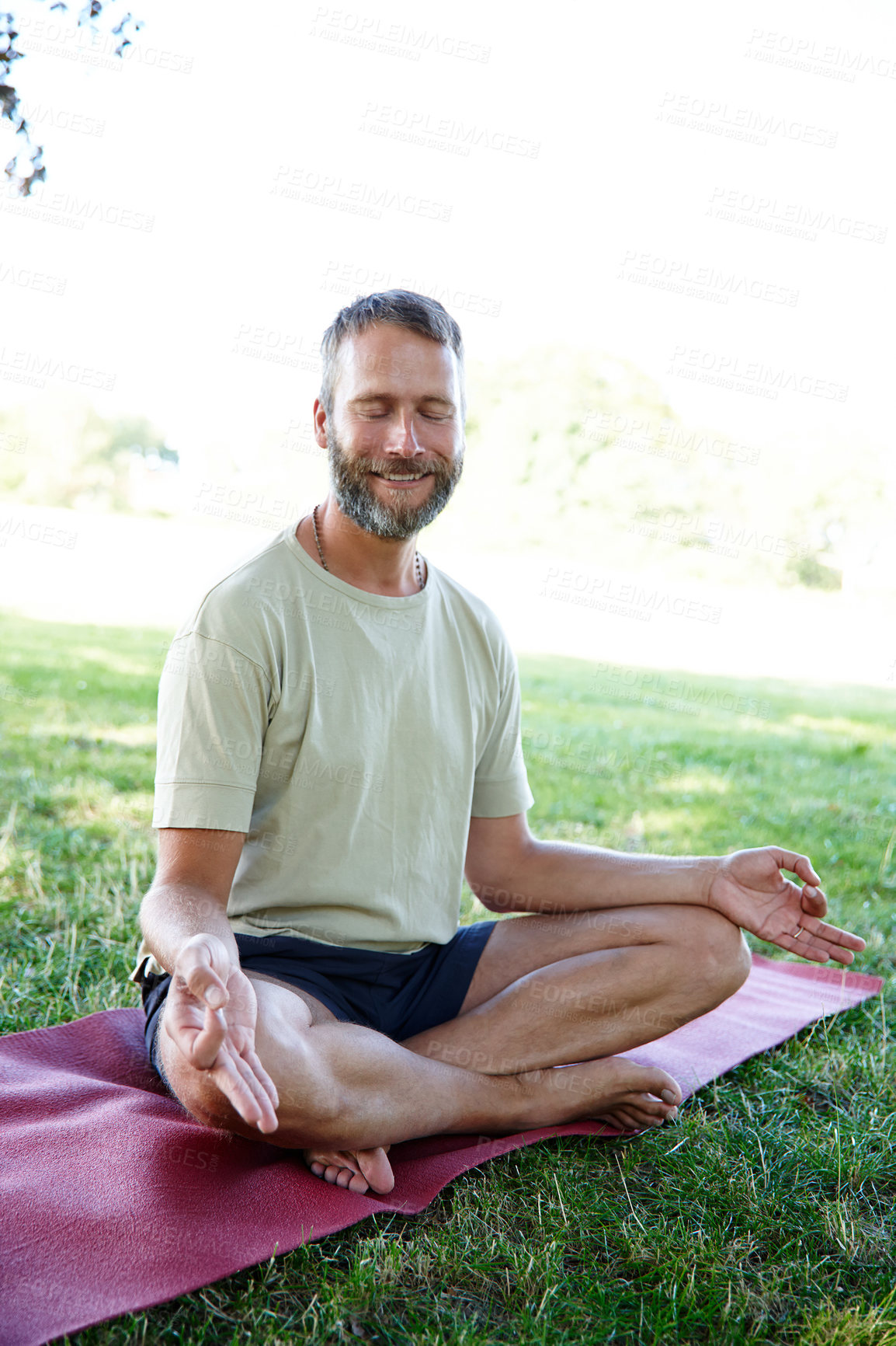 Buy stock photo Nature, yoga mat and man with eyes closed, meditation and peace with wellness, morning routine and lotus. Happy, person and healthy guy with exercise, fitness and balance with break, zen and chakra