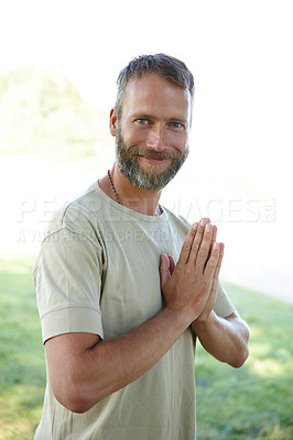 Buy stock photo Portrait, yoga and man with routine, meditation and smile with wellness, nature and lotus. Face, person and guy with exercise, outdoor or joy with break, zen and chakra with fitness or hands together