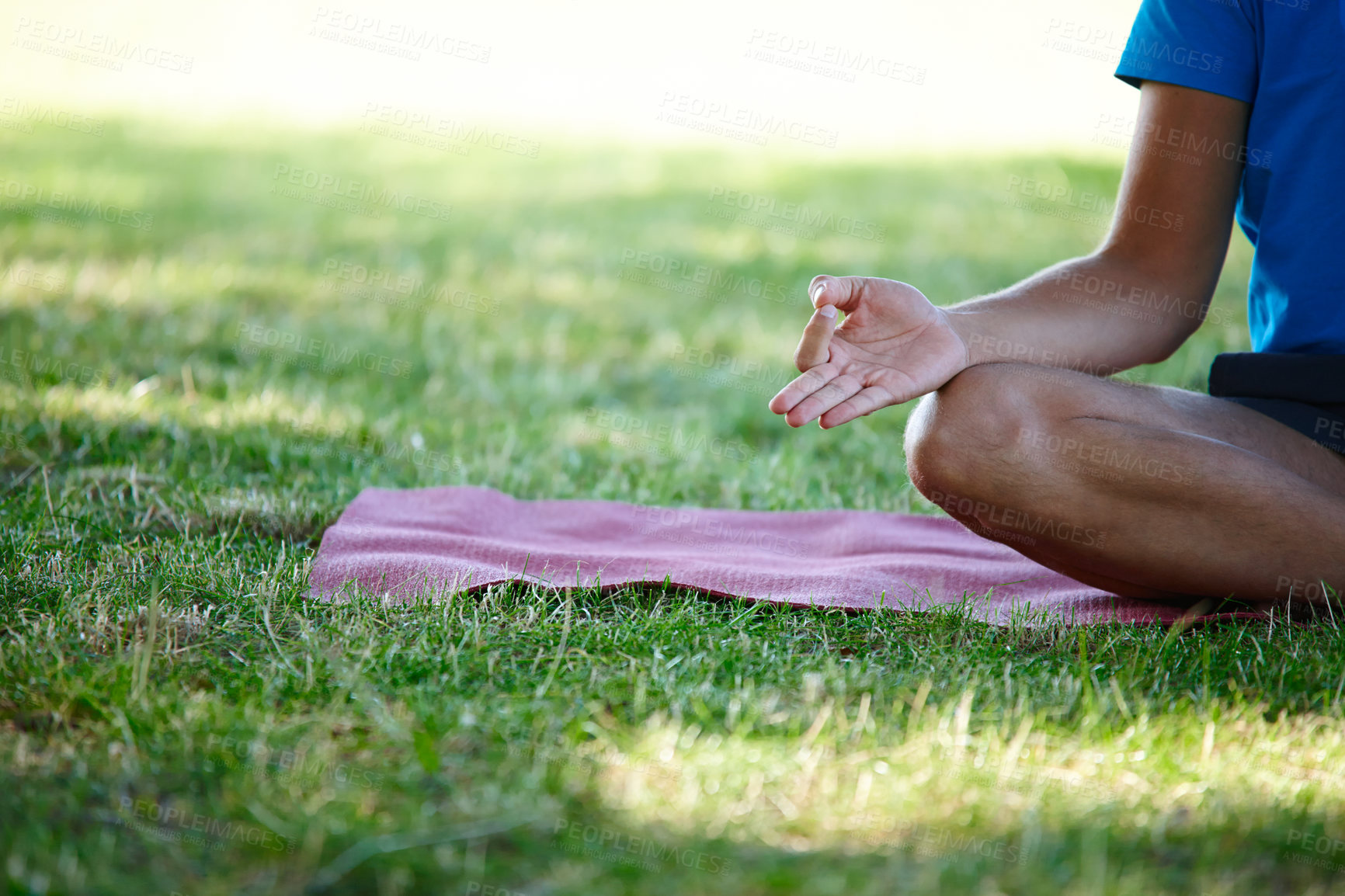 Buy stock photo Park, hands and man for mediation on mat with mindfulness, peace and calm for mental health. Male person, outdoor and lotus pose on grass with zen for spirituality, relax and self care or fitness