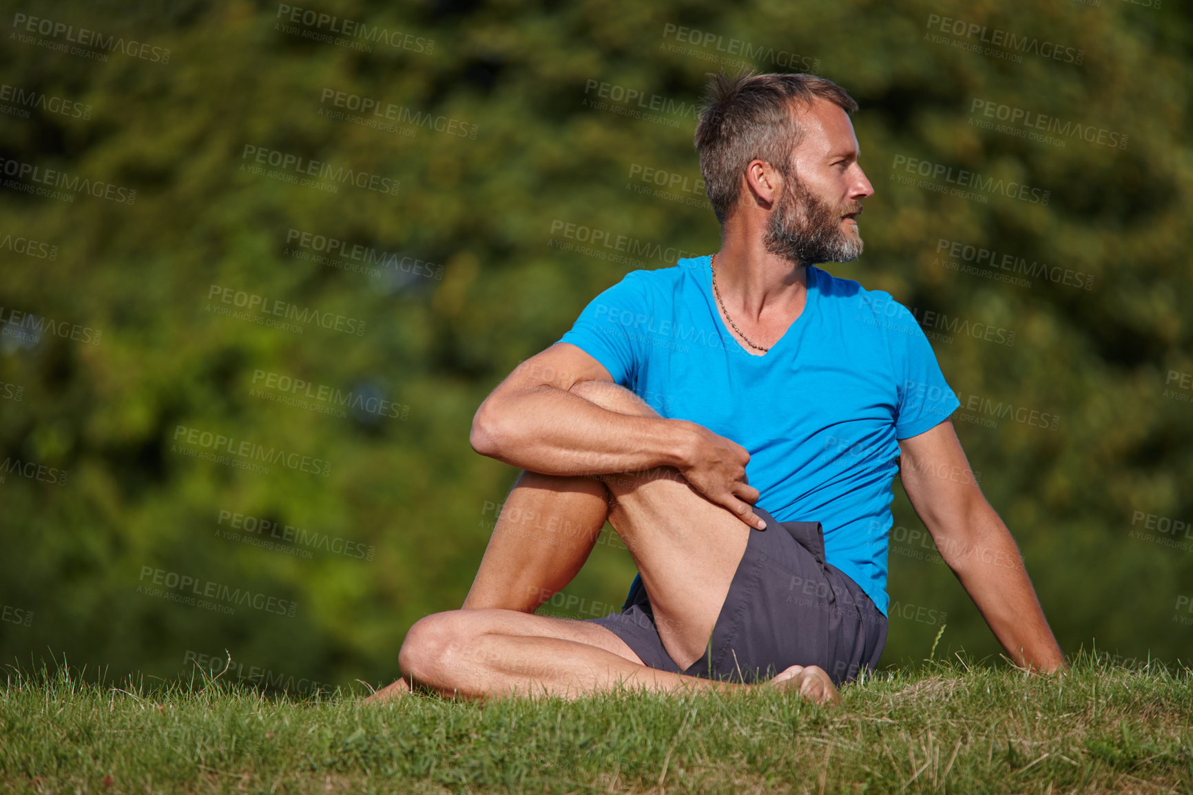 Buy stock photo Mature man, yoga and stretching in nature for fitness, wellness and spiritual healing. Person, Lord of the Fishes and pilates on park grass for holistic activity, peaceful environment or zen in Italy