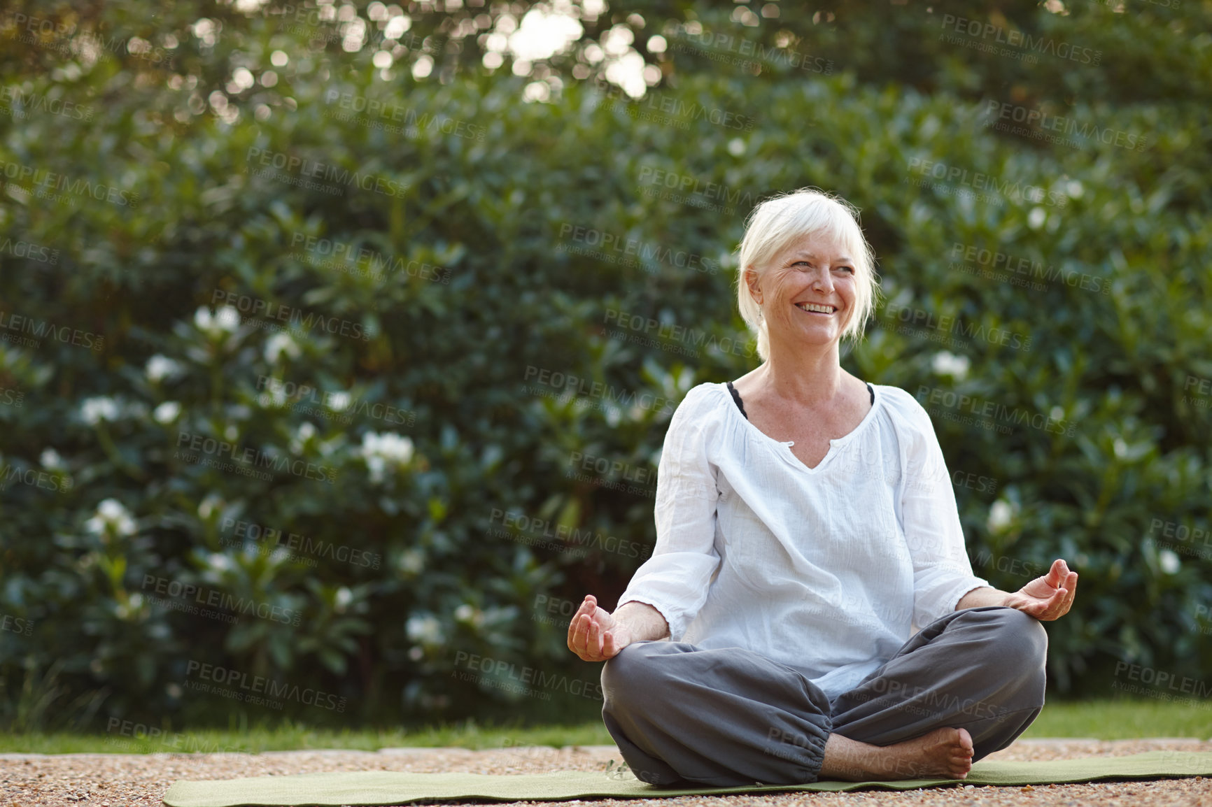 Buy stock photo Meditation, lotus pose and woman outdoor for relax, calm and grounding exercise in morning. Health, peaceful and senior female person in padmasana for flexibility, balance and mindfulness in nature.