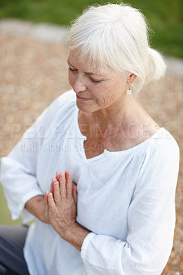 Buy stock photo Praying, hands or mature woman with meditation in park for yoga, holistic wellness or mindfulness. Outdoor, senior person or namaste pose in nature for zen, spiritual healing or peaceful with posture