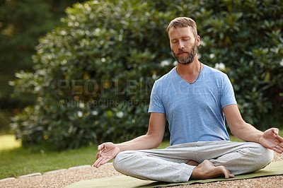 Buy stock photo Meditation, lotus pose and calm man in nature for relax, zen and grounding exercise in morning. Health, peaceful and male person in padmasana for outdoor flexibility, balance and mindfulness.