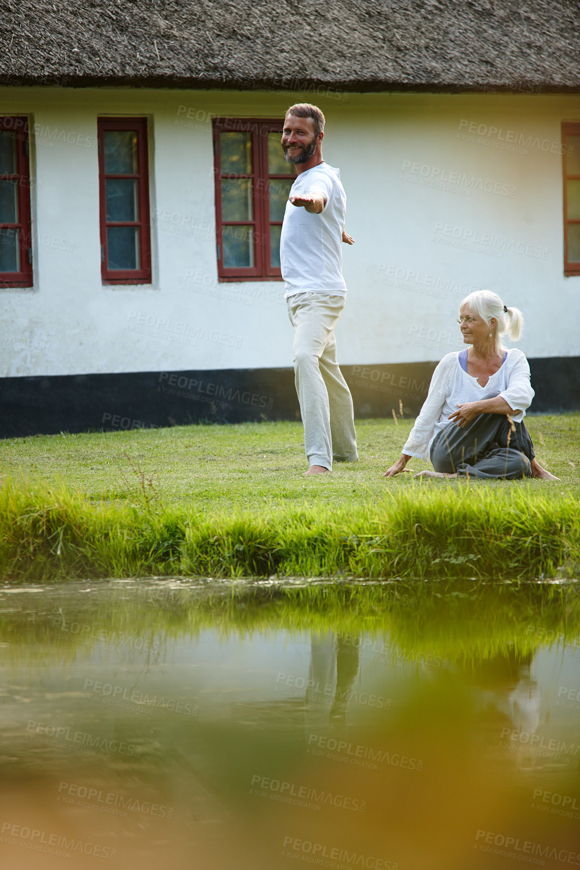 Buy stock photo Outdoor, instructor and teaching of woman, meditation and mindfulness of people, chakra and peace. Health club, teacher and man with client, fitness and zen in morning, spiritual and faith for yoga