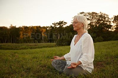 Buy stock photo Calm, lotus pose and woman in nature for relax, meditation and grounding exercise in morning. Health, peaceful and senior female person in padmasana for outdoor flexibility, balance and mindfulness.