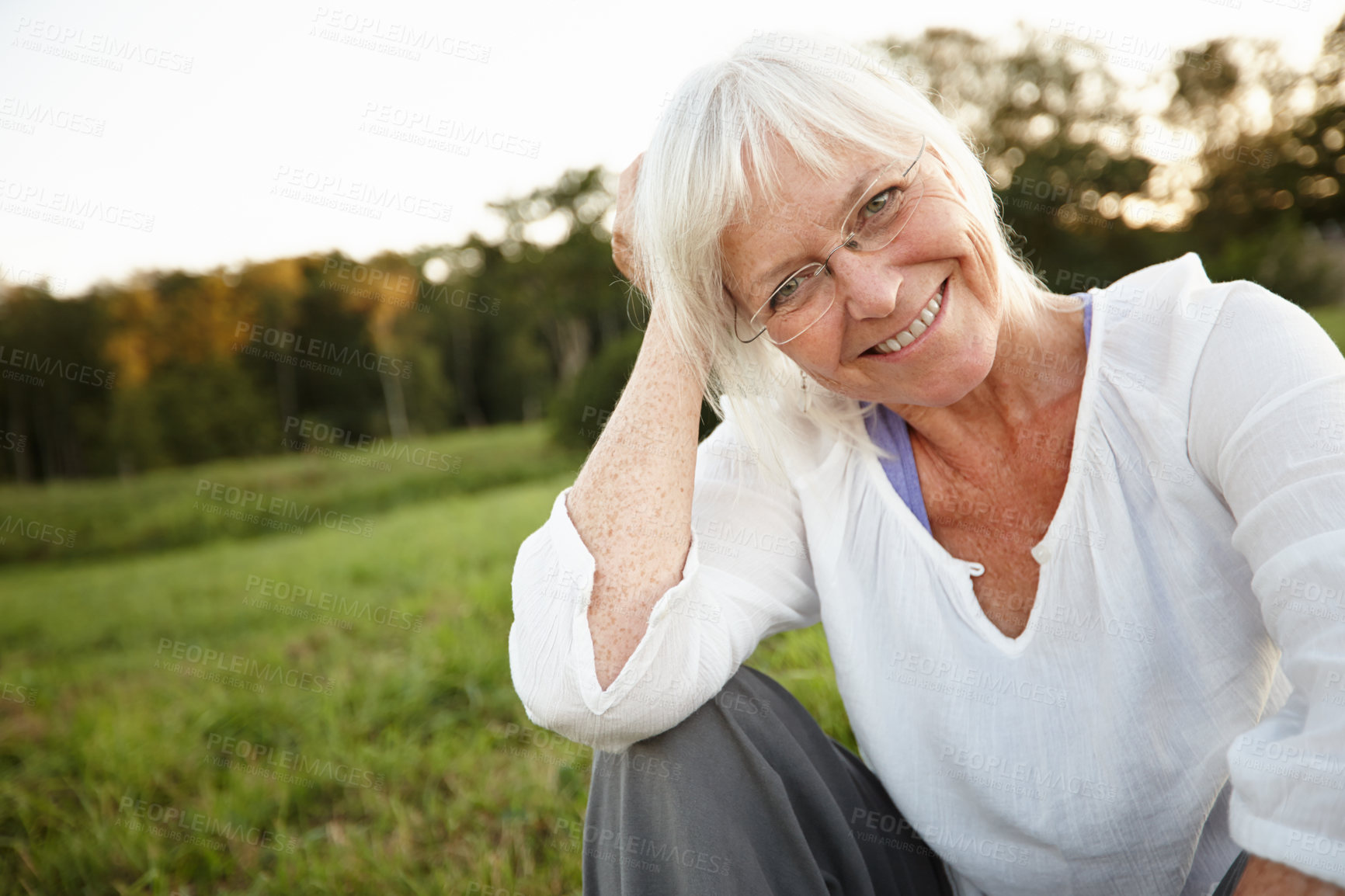 Buy stock photo Holiday, happy and portrait of senior woman with confidence for retirement, smile and outdoor exploring. Nature, mature person and relax in New York park for vacation, tourism and health or wellness