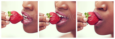 Buy stock photo A young woman eating strawberries