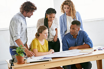 Buy stock photo Creative business people, blueprint and planning in meeting for architecture or construction on office desk. Architect group in project discussion with floor plan in team collaboration for startup