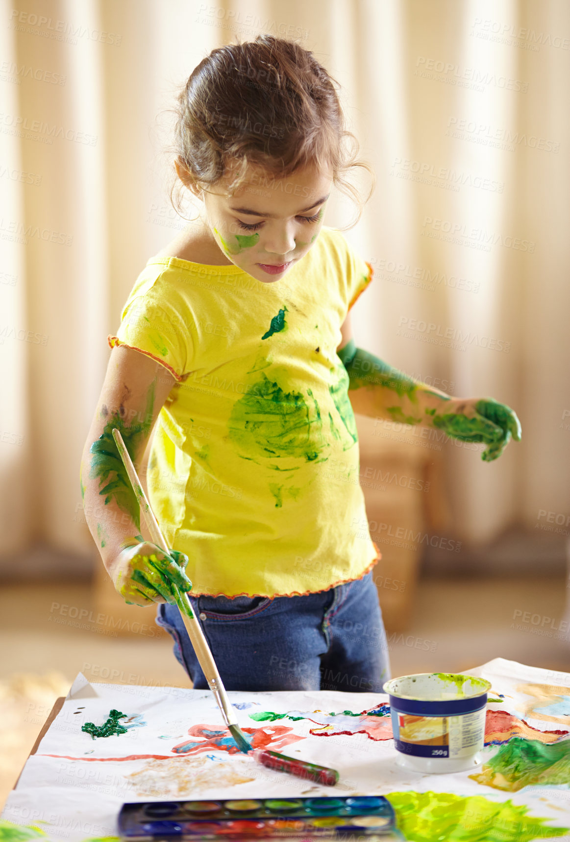 Buy stock photo Preschool, painting and brush for girl, paper and creativity, growth and development of child with mess. Childcare, learning and table for artwork, color and smile of kid, happy and young painter