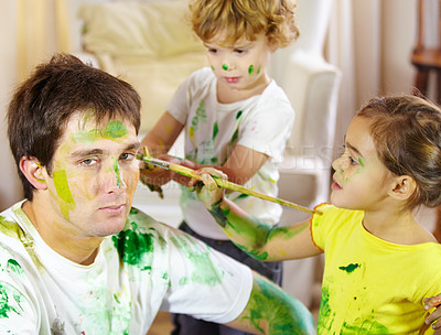 Buy stock photo Home, painting and brush for girl, portrait and father, growth and development of child with mess. Childcare, boy and dad for artwork, color and smile of kid, happy and young painter and creativity