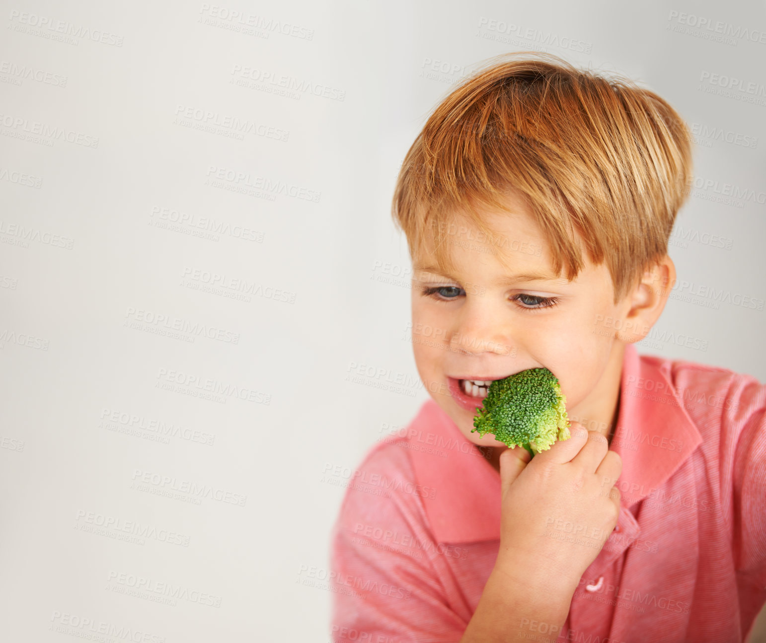 Buy stock photo Child, broccoli and vegetables eating for healthy nutrition meal, hunger or mockup. Male person, hand and white background or fibre diet vegetarian lunch food vitamins, eco greens or dinner vitality