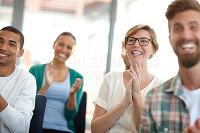 Buy stock photo Shot of a group of young designers applauding a work presentation