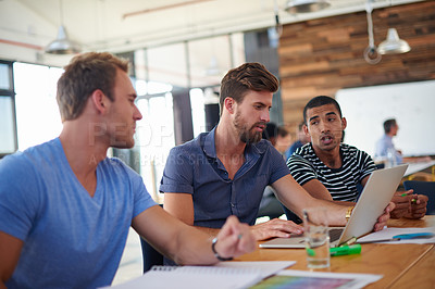 Buy stock photo A group of informal businesspeople in a meeting