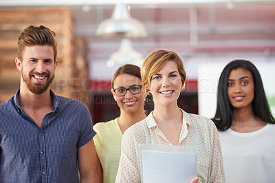 Buy stock photo Portrait of a team of confident colleagues in a casual working environment