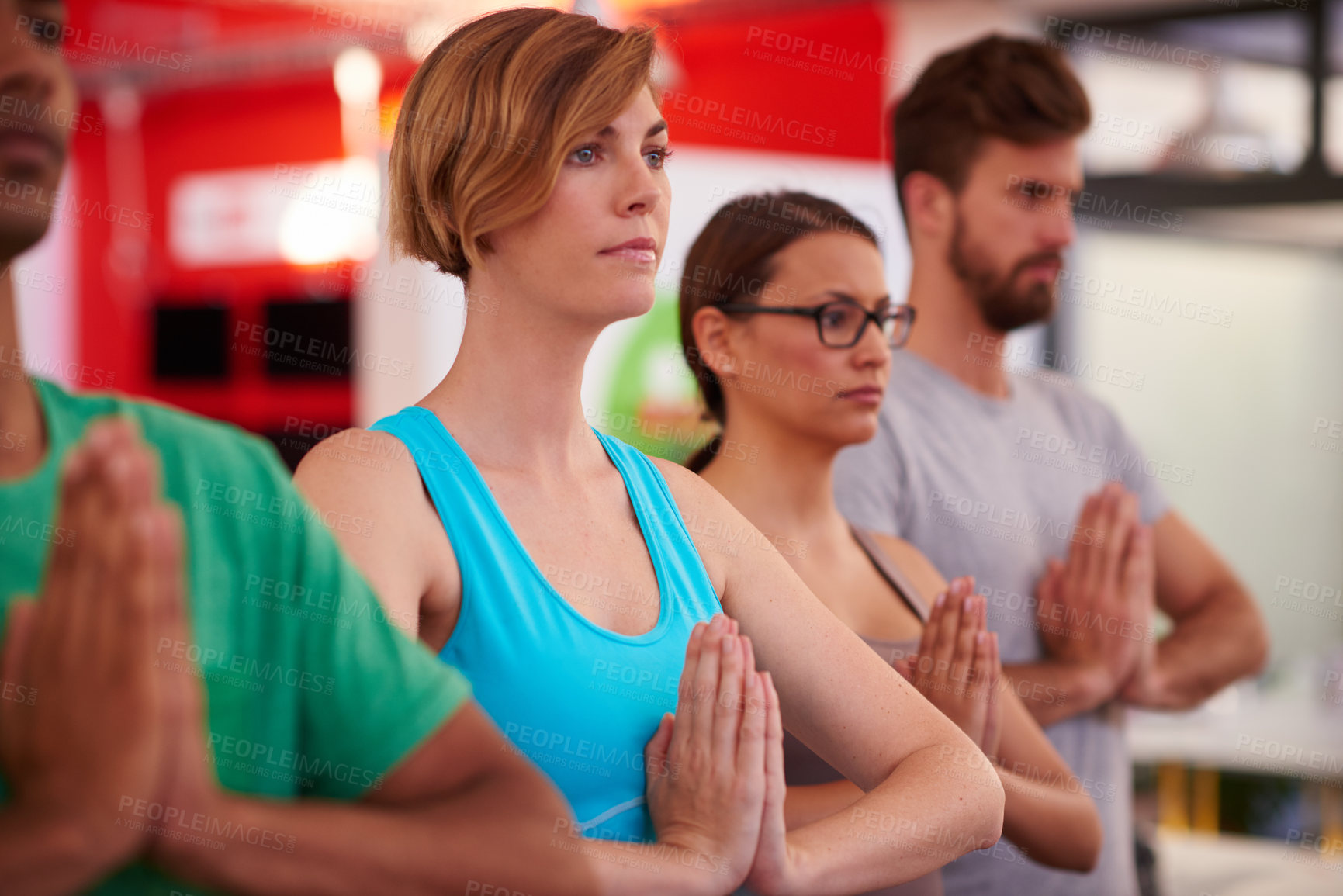 Buy stock photo A group of people doing yoga together